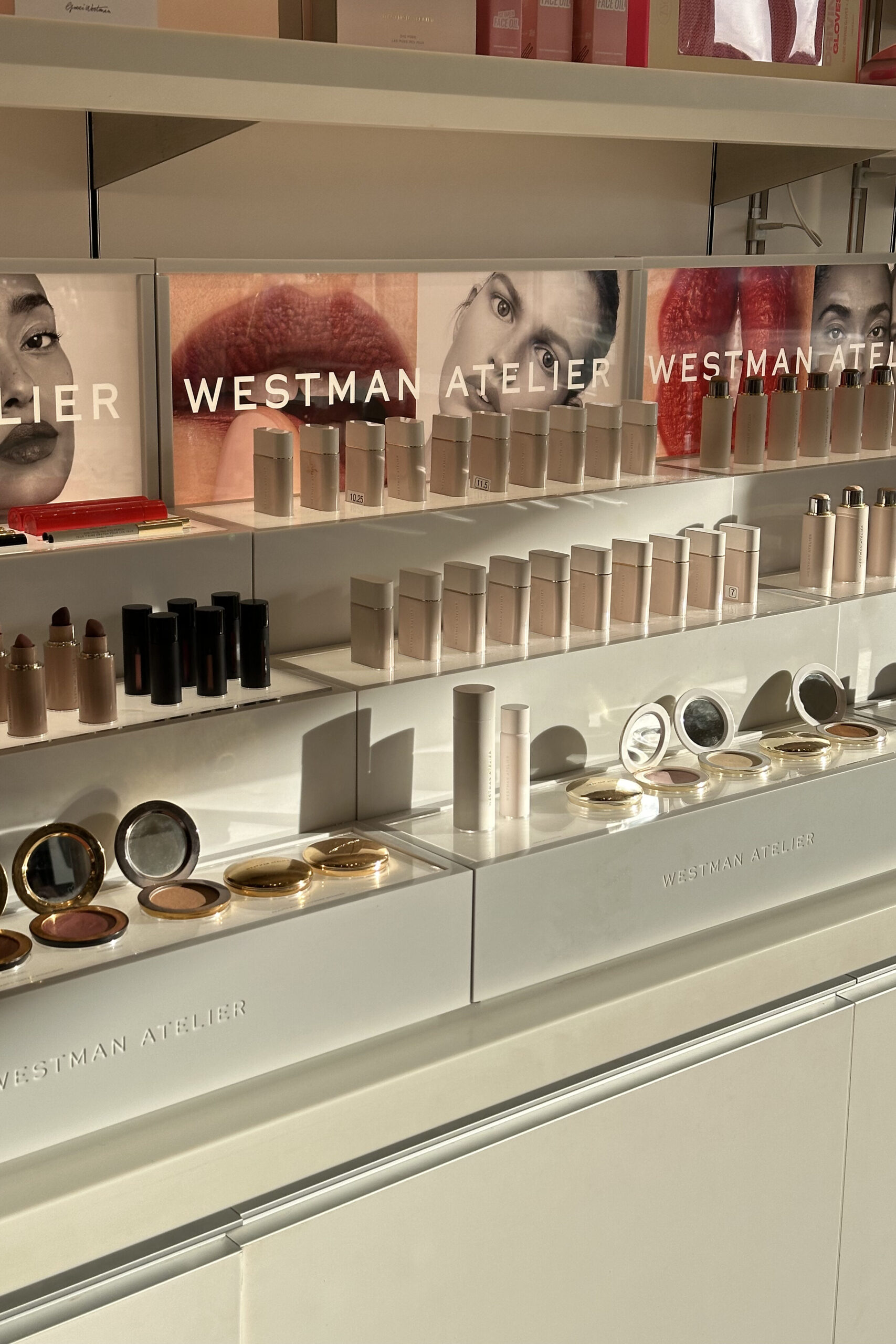 rows of makeup on shelves in store